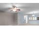 Living room view showcasing ceiling fan and open layout, flowing into the kitchen area at 407 Eastwood Dr, Salisbury, NC 28146