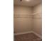 Spacious walk-in closet featuring ample shelving for storage and organization at 4304 Fletcher Funderburk Rd, Lancaster, SC 29720