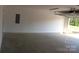 Spacious garage with high ceilings and a large door at 4304 Fletcher Funderburk Rd, Lancaster, SC 29720