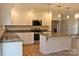 Bright kitchen features white cabinetry, granite countertops, and stainless steel appliances at 4304 Fletcher Funderburk Rd, Lancaster, SC 29720