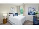 Cozy bedroom with natural light, plush bedding, and tasteful decor creates a relaxing atmosphere at 4615 Harris Elliot Rd, Lincolnton, NC 28092