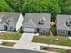 An aerial view of the home showcasing the landscaping and surrounding neighborhood at 5101 Helmsworth Dr, Waxhaw, NC 28173