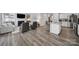 Open concept living room and kitchen area, fireplace, and modern furnishings at 5101 Helmsworth Dr, Waxhaw, NC 28173