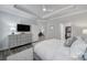 Comfortable main bedroom with tray ceilings, wood-look floors, and a walk-in closet at 5101 Helmsworth Dr, Waxhaw, NC 28173