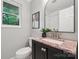 Modern bathroom with vanity and granite counter at 513 Inwood Dr, Charlotte, NC 28209