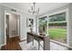 Sunlit home office featuring a large window overlooking the lawn and a modern desk at 513 Inwood Dr, Charlotte, NC 28209