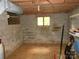 Unfinished basement with concrete walls, a window, and exposed ceiling at 5209 Markay St, Matthews, NC 28105