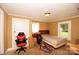 A cozy bedroom with natural light and modest furnishings at 615 Mauney Ave, Kings Mountain, NC 28086