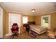A cozy bedroom with natural light and modest furnishings at 615 Mauney Ave, Kings Mountain, NC 28086