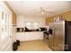 Functional kitchen featuring stainless steel appliances and white cabinetry at 615 Mauney Ave, Kings Mountain, NC 28086