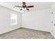 Bedroom featuring carpet, light-filled window, and ceiling fan at 624 W Kerr St, Salisbury, NC 28144