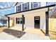 New construction home with a covered front porch and freshly seeded landscaping in front at 624 W Kerr St, Salisbury, NC 28144