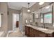 Spacious bathroom featuring double vanities and access to a walk-in closet at 728 Palmers Pl, Rock Hill, SC 29730