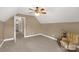 Neutral bedroom features a ceiling fan, and door to hallway at 728 Palmers Pl, Rock Hill, SC 29730