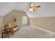 Spacious bedroom with slanted ceilings, carpeted floor, and natural lighting at 728 Palmers Pl, Rock Hill, SC 29730