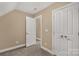 Comfortable bedroom featuring neutral walls, carpet, and multiple closets at 728 Palmers Pl, Rock Hill, SC 29730