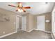 Bedroom with ceiling fan, two windows and carpet at 728 Palmers Pl, Rock Hill, SC 29730