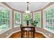 Bright dining nook with large windows and wood floors at 728 Palmers Pl, Rock Hill, SC 29730