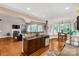 Open layout kitchen and living room with bar seating and seamless flow at 728 Palmers Pl, Rock Hill, SC 29730
