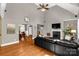 Open-concept living room with vaulted ceiling, fireplace, and hardwood floors at 728 Palmers Pl, Rock Hill, SC 29730