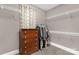 Spacious walk-in closet with built-in shelving, hanging rods, and dresser at 728 Palmers Pl, Rock Hill, SC 29730