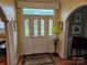 Welcoming foyer with stained glass door, hardwood floors and arched doorway at 800 Warrington Pl, Rock Hill, SC 29732