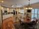 Spacious kitchen with large windows, stainless appliances, bar and breakfast nook at 800 Warrington Pl, Rock Hill, SC 29732