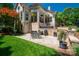 Spacious back patio with outdoor dining and grilling area, overlooking the backyard at 8028 Water View Dr, Belmont, NC 28012