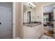 Bathroom with white cabinets, granite countertop and neutral walls that complements the classic design at 8028 Water View Dr, Belmont, NC 28012