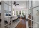 Inviting main bedroom with a ceiling fan, bay windows and hardwood floors at 8028 Water View Dr, Belmont, NC 28012