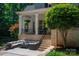 Outdoor patio space featuring comfortable furniture, steps leading to the pool area, and a lush backyard at 8028 Water View Dr, Belmont, NC 28012