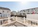 Townhome balcony overlooking the neighborhood with white railings and neutral siding at 8177 Millwright Ln, Charlotte, NC 28277