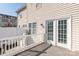 Inviting townhome balcony with sliding glass doors, offering a relaxing retreat at 8177 Millwright Ln, Charlotte, NC 28277