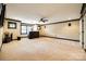 Spacious finished basement featuring a large carpeted area, wet bar, and neutral walls at 8239 Victoria Lake Dr, Waxhaw, NC 28173