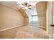 Cozy bedroom with dormer window and plush carpeting at 8239 Victoria Lake Dr, Waxhaw, NC 28173
