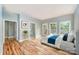 Bright bedroom with hardwood floors and lots of windows at 9066 Tulagi Ct, Tega Cay, SC 29708