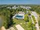 Beautiful community pool, beach volleyball court, and surrounding landscape with ample parking at 9066 Tulagi Ct, Tega Cay, SC 29708