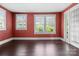 Bright room with hardwood floors, natural light, and French doors at 920 Queens Rd, Charlotte, NC 28207