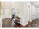 Bright foyer with hardwood floors, high ceilings, and stylish accents at 1004 Princesa Dr, Matthews, NC 28104