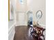 Inviting foyer with high ceilings, hardwood floors, and elegant decor at 1004 Princesa Dr, Matthews, NC 28104