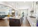 Spacious open-concept kitchen with an island, stone countertops, and modern appliances at 1004 Princesa Dr, Matthews, NC 28104