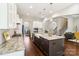 Modern kitchen with a central island, and stainless steel appliances at 1004 Princesa Dr, Matthews, NC 28104