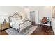 Comfortable main bedroom with hardwood floors, a neutral color palette, and a cozy ambiance at 1004 Princesa Dr, Matthews, NC 28104