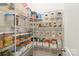 Well-organized pantry with ample shelving and clear storage containers at 1004 Princesa Dr, Matthews, NC 28104