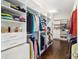 Spacious walk-in closet with custom shelving and ample storage for clothes, shoes, and accessories at 1004 Princesa Dr, Matthews, NC 28104