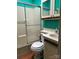 Well-lit bathroom with white fixtures and vanity, toilet and a shower-tub combo at 101 Dogwood Cir, New London, NC 28127