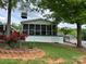 Exterior of a well-maintained home with a lovely screened-in patio at 101 Dogwood Cir, New London, NC 28127