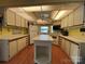 Spacious kitchen with ample counter space, white cabinets, and a center island at 101 Dogwood Cir, New London, NC 28127