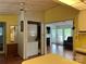 Charming open-concept living room featuring a fireplace, abundant natural light, and warm, inviting decor at 101 Dogwood Cir, New London, NC 28127