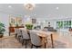Open concept dining room seamlessly blends with the living area creating an ideal space for entertaining guests at 1118 Crestbrook Dr, Charlotte, NC 28211